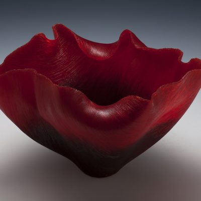 Fused and slumped red glass monofilaments sculpture by Toots Zynsky